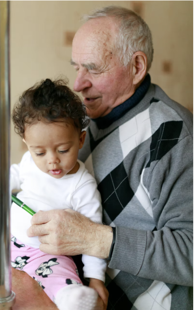 grandpa holding baby